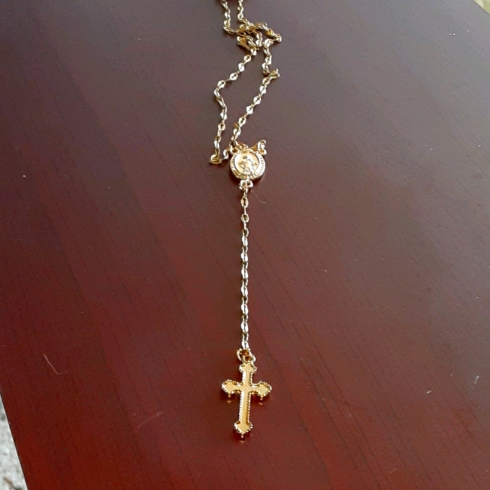 Gold St. Marie rosary pendant